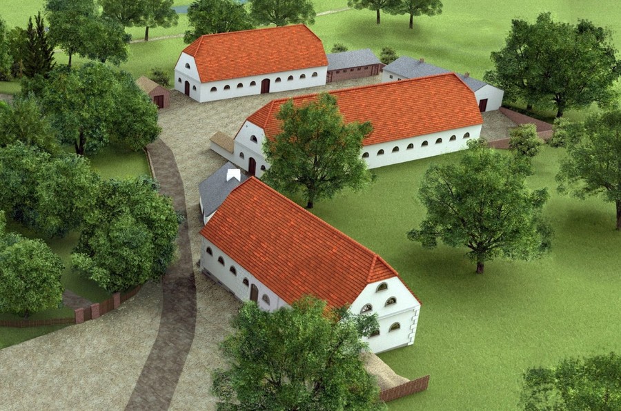 Rekonstrukcja zabudowań gospodarczych dawnego folwarku w Kłóbce (na pierwszym planie spichlerz)