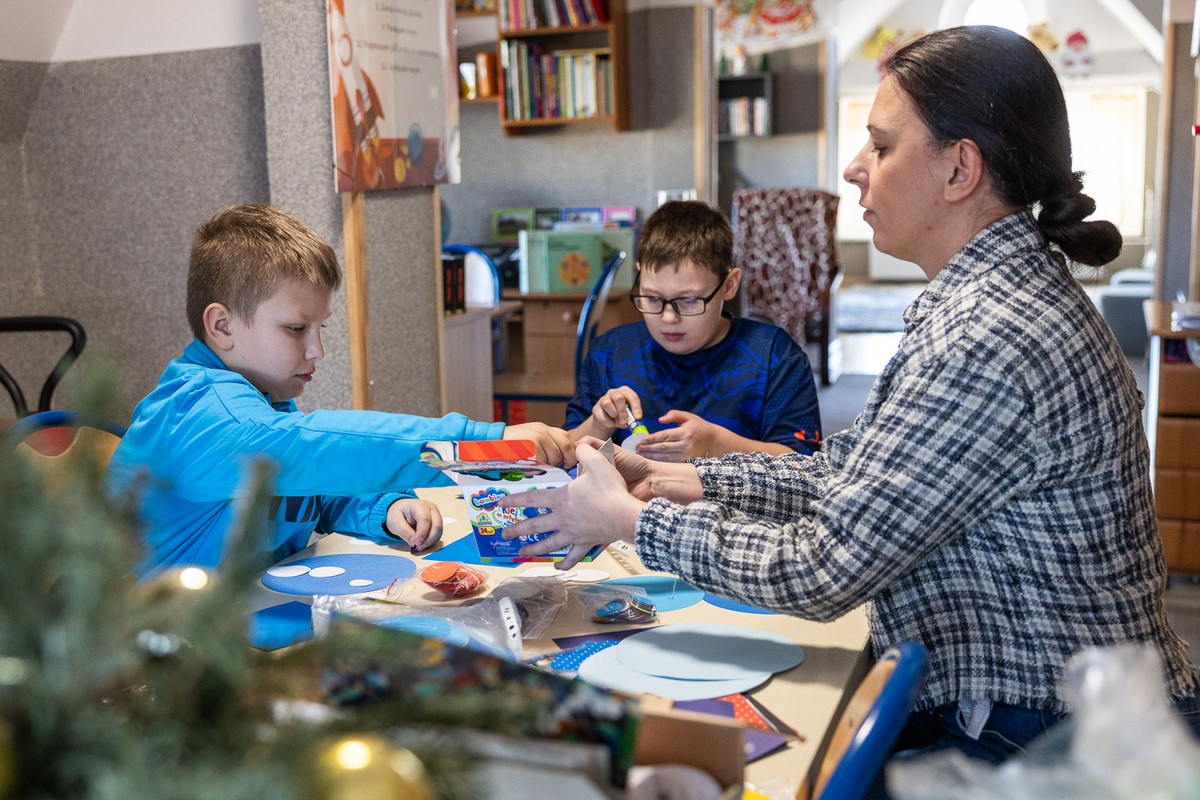 Two children with their teacher during art classes at the Special Educational Centre in Grudziądz,
